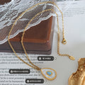 Teardrop White Shell Pendant Necklace Blue Center Stone view 2