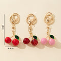 Enamel Cherry Charm Keychain In Red Dark Red And Pink view 6