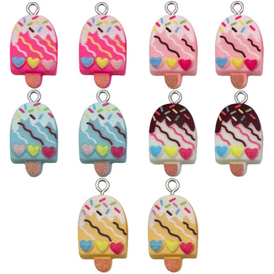 Multicolor ice cream charms arranged on a light background