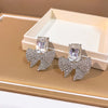 White Bow Studs