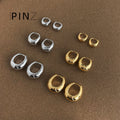 Polished Oval Huggie Hoop Earrings In Gold Silver And Three Sizes view 3