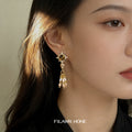 Gold Tone Brown Stone Starburst And Pearl Tassel Stud Earrings view 2