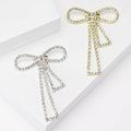 Long Crystal Bow Brooch in Silver and Gold Tone Decorative Lapel Accessory view 1