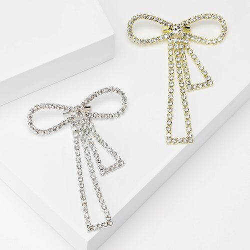 slender crystal bow brooch shown from the front