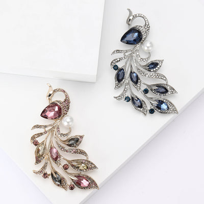 Crystal Phoenix Brooch in Blue and Pink displayed from the front