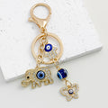Blue Evil Eye Elephant Hamsa Hand Rhinestone Gold-Tone Keychain view 3