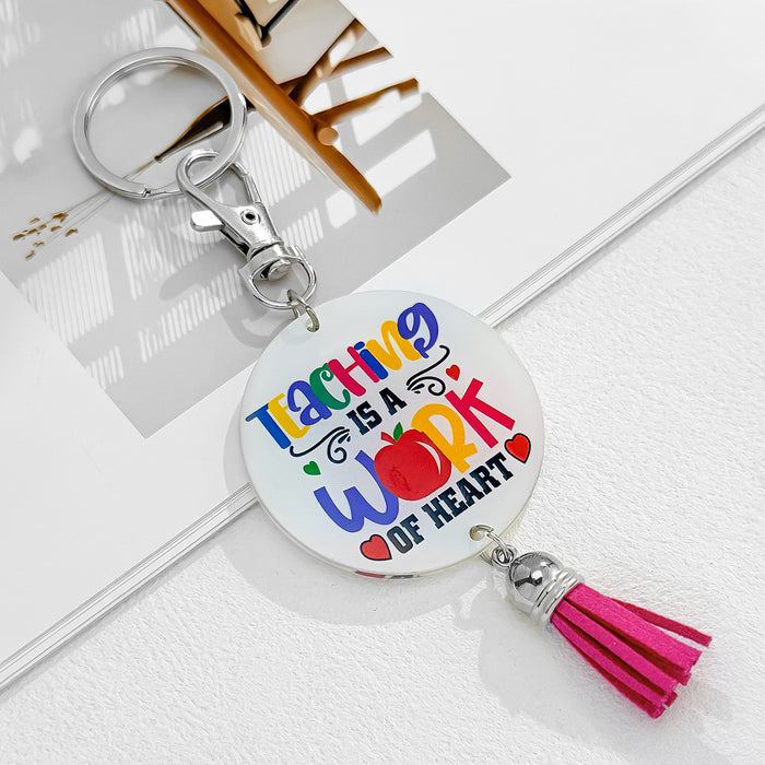 White Acrylic Teacher Quote Disc Keychain With Suede Tassel