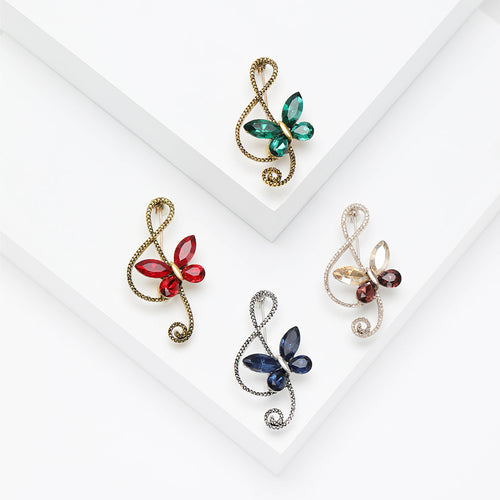 Butterfly Treble Clef Brooch shown on a clean white display