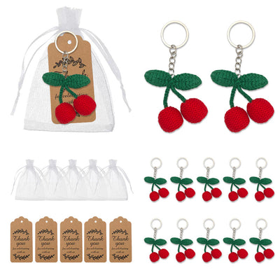 Crochet cherry keychains with white organza bags and kraft tags