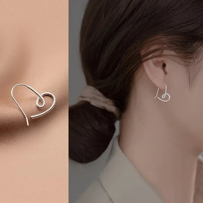 Product view showing a single wire line curling into an open heart and long hook
