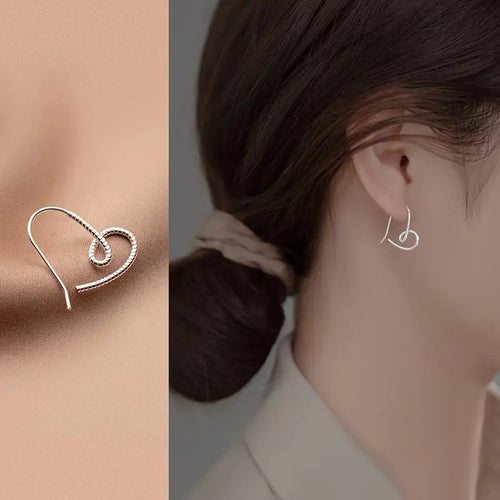 Product view showing a single wire line curling into an open heart and long hook