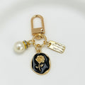 Gold Tone Crystal Charm Keychain With Faux Pearl Pendant view 10