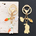 Thirteen White and Pink Rabbit Floral Metal Keychain Designs view 2