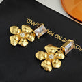 Clear Rectangular Crystal and Flower Drop Earrings in Gold Tone view 2
