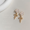 White Enamel Camellia Stud Gold Bow Drop Earrings Pair view 1