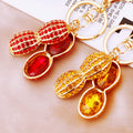 Jeweled Money Peanut Keychains in Red and Yellow with Plain and Fortune Loops view 3