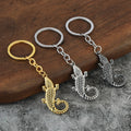 Textured Crocodile Metal Keychain in Gold, Silver, and Gunmetal Tones view 1