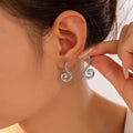 Spiral Swirl Geometric Stud Earrings Gold Steel Pair view 3