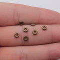 Smooth Ring Metal Spacer Beads in Two Vintage Finishes view 4