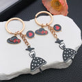 Black Polka Dot Dress Hat and Heart Metal Keychain view 1