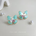Mint Green Enamel Butterfly Stud Earrings With Pearl Accents view 1