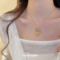 Gold Tone Bow And Flower Pendant Necklace With Teardrop Charms view 4