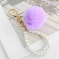 Faux Fur Pom-Pom Keychain with Faux Pearl Wristlet Strap view 3