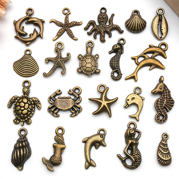 Gold-Tone Starfish and Shell Shell Charms with 26 Listed Options