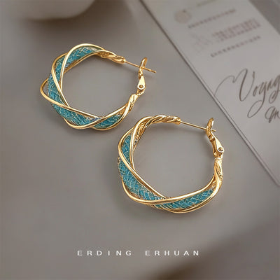 Gold-tone aqua-enamel twisted multi-strand hoop earrings in the first product display.