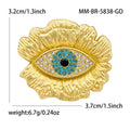 Blue Eye Textured Gold Brooch in Detailed Metal and Crystal Design view 6
