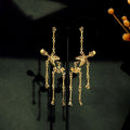 Silver and Gold Articulated Skeleton Dangle Earrings view 2