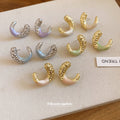 Pair of Metal Tone Purple Enamel Textured C-Shaped Stud Earrings view 1