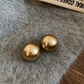 Round Pearl Look Stud Earrings in White and Bronze Tones view 6