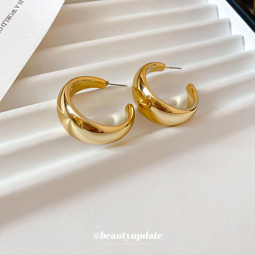 Gold C Hoop earrings in close view