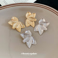 Textured Layered Petal Statement Stud Earrings Matching Jewelry Pair view 2