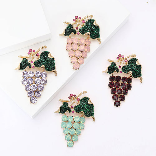 Front product view of the crystal grape cluster brooch on a light background