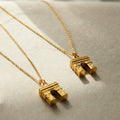 Gold Arc De Triomphe Pendant Necklace Chain Extender view 1