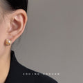 White Pearl Stud Earrings Gold Tone Organic Petal Frame view 4
