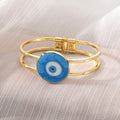 Gold Tone Round Glass Evil Eye Hinged Cuff Bracelets in Eight Colors view 11