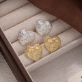 Textured Heart with Bow Detail Statement Stud Earrings view 2