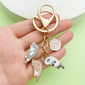 Cat Charm Keychains Featuring Cat Across 33 Pictured Variations view 2