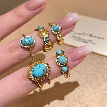Gold Open Oval Turquoise Cabochon Twisted Band Ring