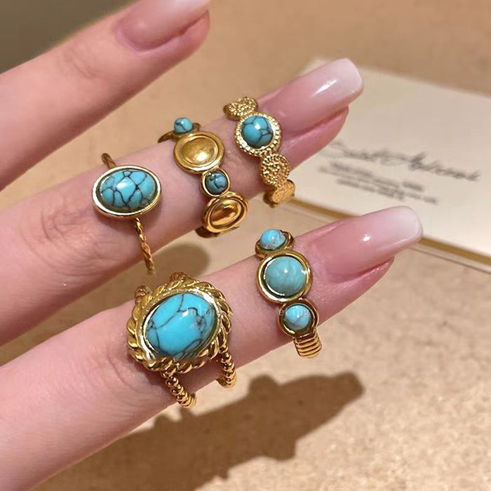 Gold Open Oval Turquoise Cabochon Twisted Band Ring