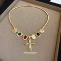 Gold Tone Multicolor Stone Cross Pendant Necklace With Polished Metal Details view 2
