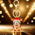 Red Jeweled Wealth Deity Keychain with Gold Tone Hardware view 2