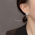 Silver Tone Purple Flower Green Leaf Earrings In Stud And Clip On Styles view 2