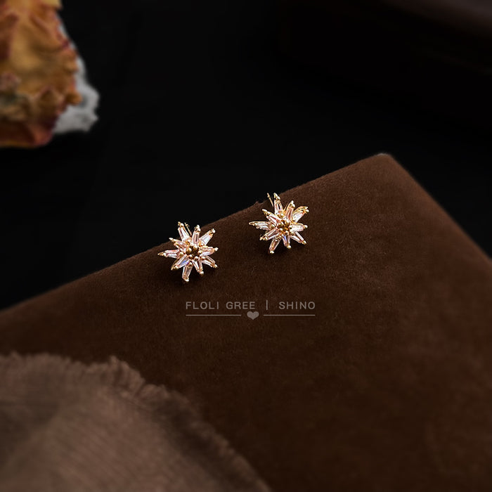 Gold Tone Starburst Stud Earrings Clear Baguette Cut Stone Accents