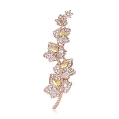 Rose gold leaf branch brooch with yellow crystals on white