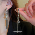 Antique Silver Tone Ball and Tassel Drop Earrings with Polished Metal Accents view 1