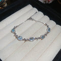 Three Pale Blue Crystal Bracelets With Oval Heart Or Mixed Centers view 6